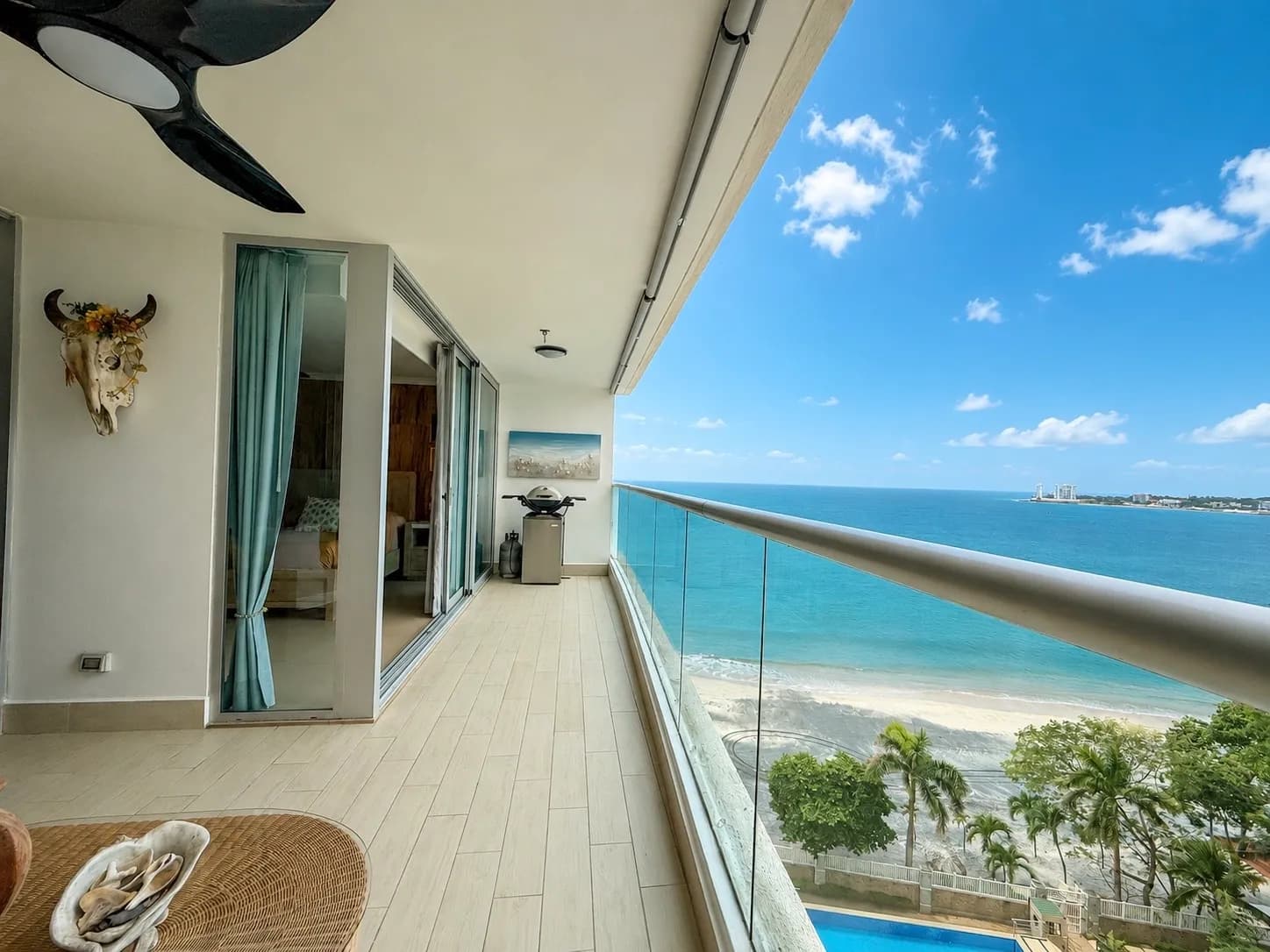 Stunning & Tastefully Decorated 2 Bedroom Beachfront Condo R-0019 - Image 1