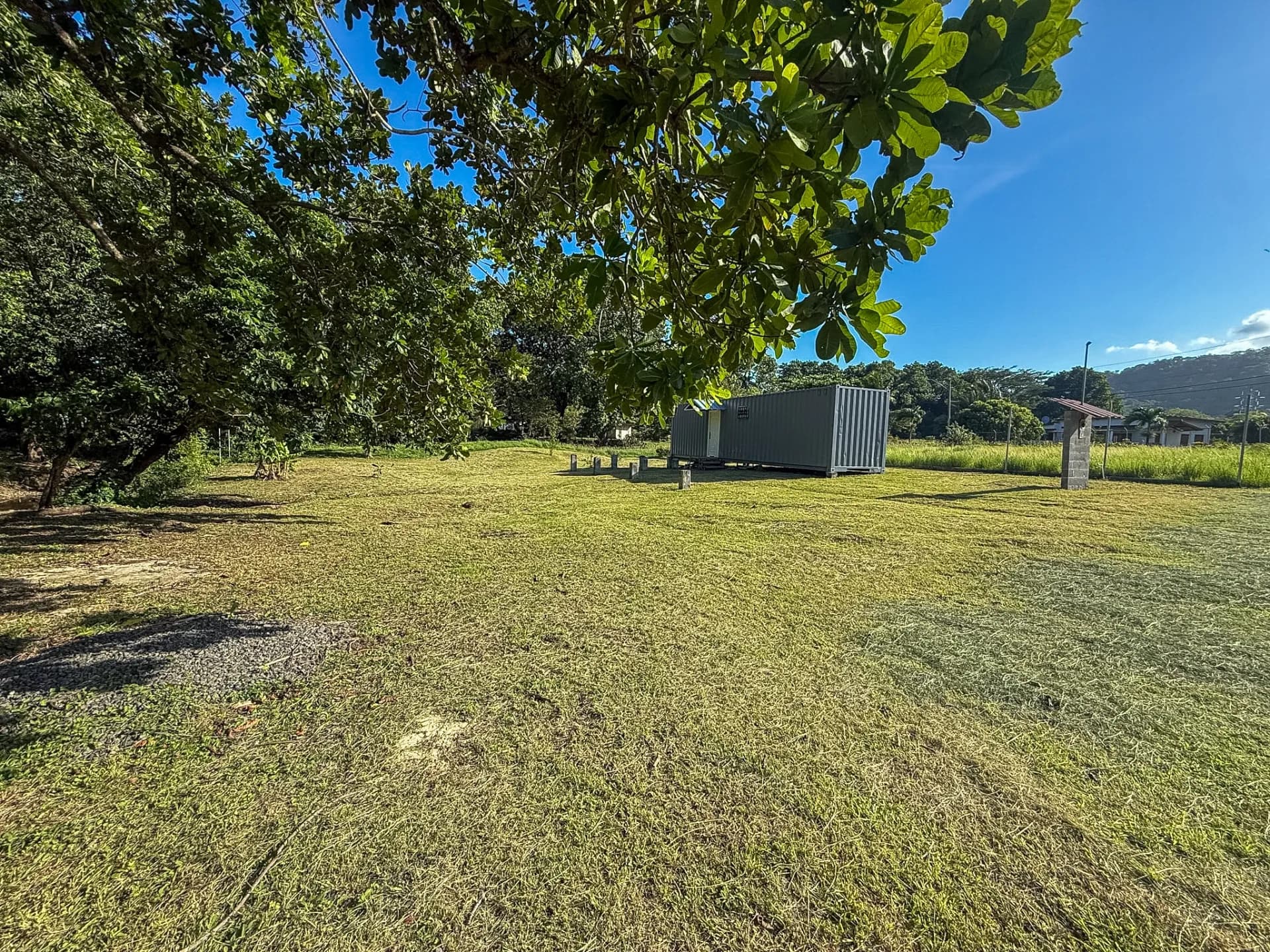 Charming 0.22-Acre Mountain View Lot with Creek Access and 40-Foot Container Home, Chame, Near Coronado. R-0058 - Image 1