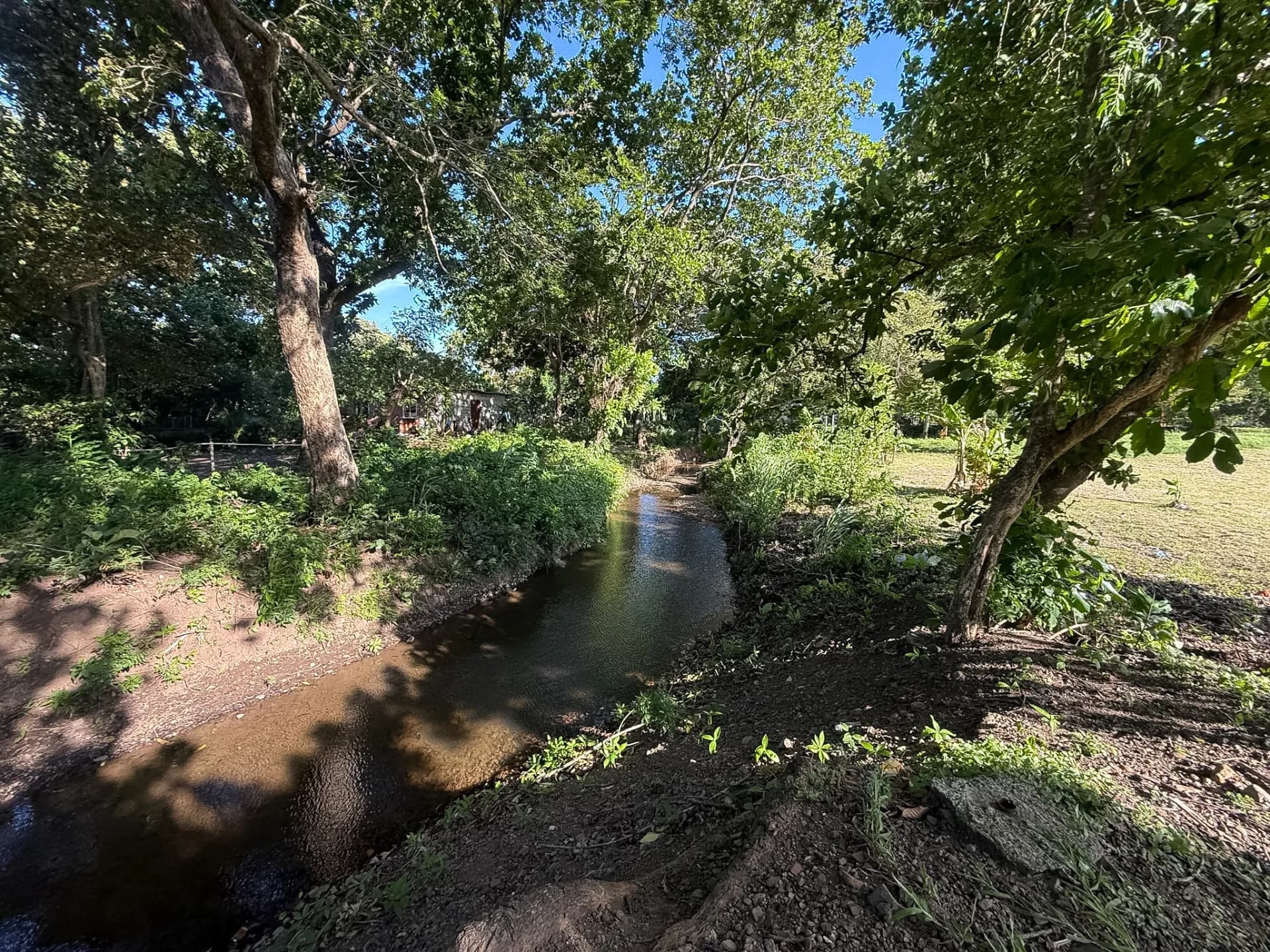 Charming 0.22-Acre Mountain View Lot with Creek Access and 40-Foot Container Home, Chame, Near Coronado. R-0058 - Image 3